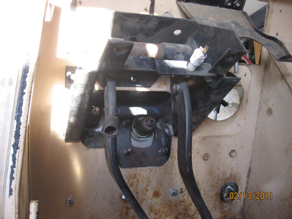 Scout pedal bracket, brake and clutch pedals, brake-light switch and steering column at firewall
