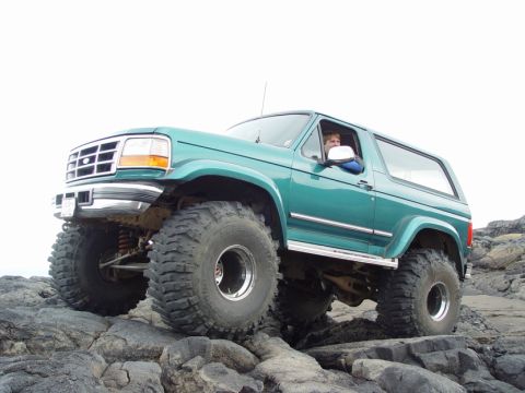 1996 Ford Bronco - This 1996 Ford Bronco is shown navigating a rocky terrain.