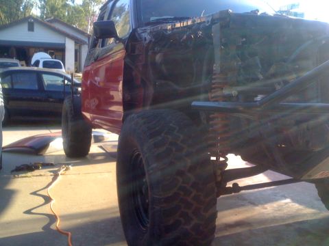1992 Ford Ranger - This heavily modified truck is missing its front clip and appears to be undergoing significant work.
