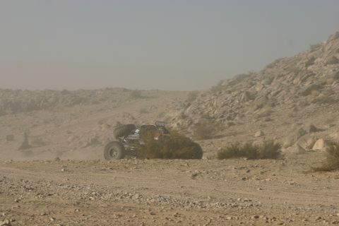 1992 Jeep Wrangler - Buggy navigates a dusty desert terrain during an off-road event.