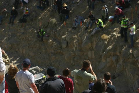 1992 Jeep Wrangler - Spectators observe an event from a hillside during the day.