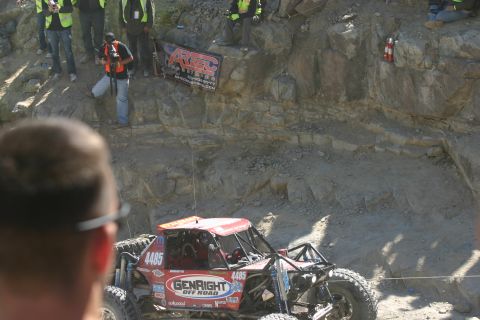1992 Jeep Wrangler - A custom-built off-road buggy navigates a challenging rocky course during an event.