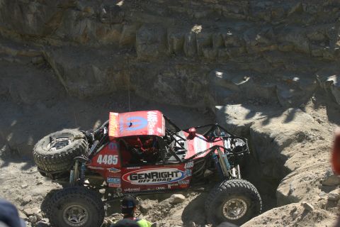 1992 Jeep Wrangler - Custom off-road buggy navigates a challenging rocky terrain during an event.
