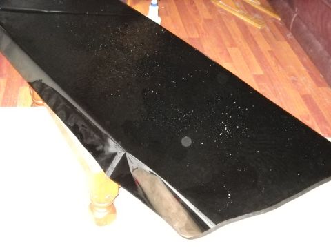 1993 Ford C-150 (Centurion Conversions) - Applying window tint film requires a clean surface and careful handling to avoid bubbles and dust.