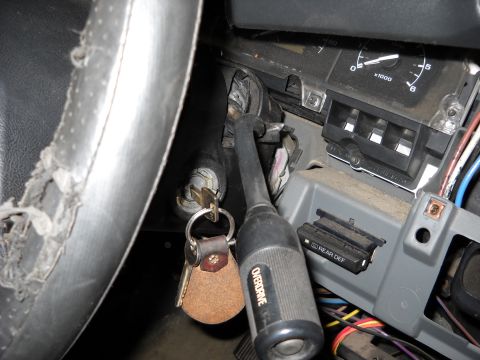 1993 Ford C-150 (Centurion Conversions) - Interior view of the steering column and dashboard of a 1993 Ford C-150 (Centurion Conversions).