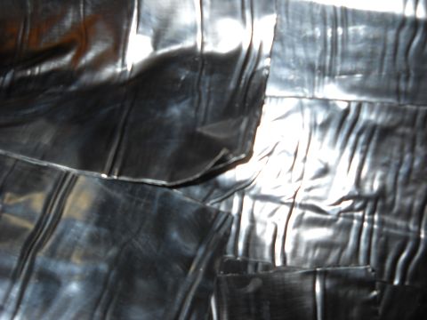 1993 Ford C-150 (Centurion Conversions) - Close-up view of textured black vinyl interior trim panels.