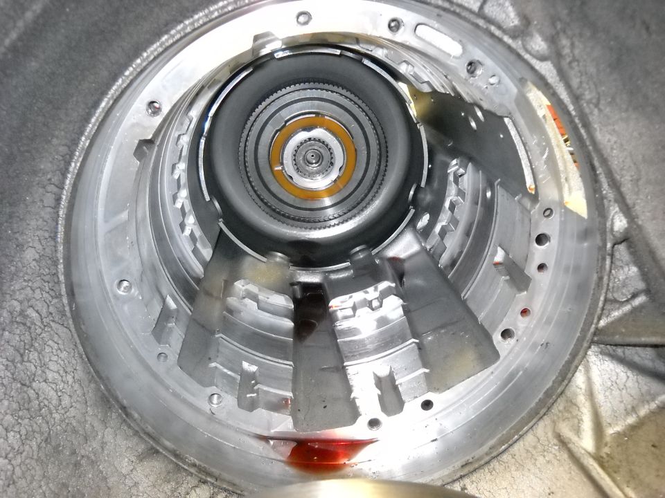 Inside of an automatic transmission, showing gears and fluid