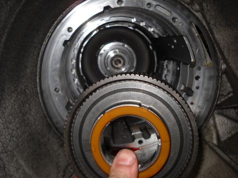 1993 Ford C-150 (Centurion Conversions) - Internal view of a vehicle transmission, focusing on the torque converter and gear components.