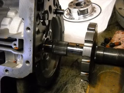 1993 Ford C-150 (Centurion Conversions) - Close-up of transmission components, likely during a rebuild or repair process.