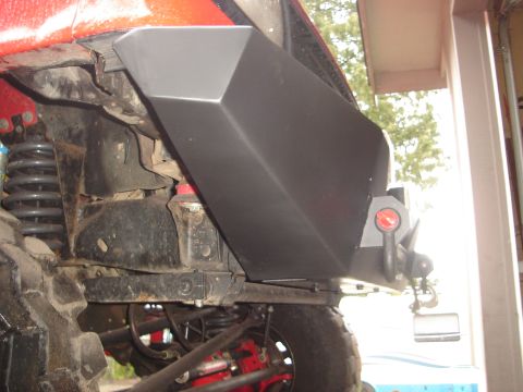 1989 Ford Bronco - Close-up view of an aftermarket bumper and suspension components on a vehicle.