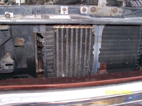 1989 Ford Bronco - Front view of a 1989 Ford Bronco, revealing the radiator and condenser assembly.