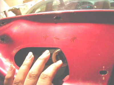 1997 Ford Taurus - You need to line up the holes you made in the lightbar and then make a mark in the trunk .. preferably with a sharpie