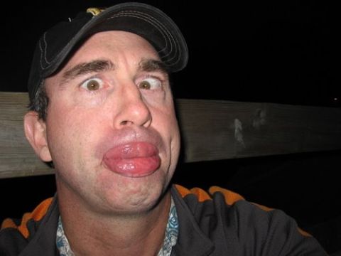 2008 Ford F-250 - A man makes a humorous facial expression, with his lips and tongue enlarged.