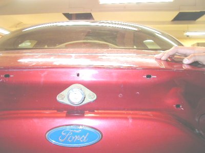 1997 Ford Taurus - As I found out, you DO NOT need to take off the latch on the hood to take the lightbar off...