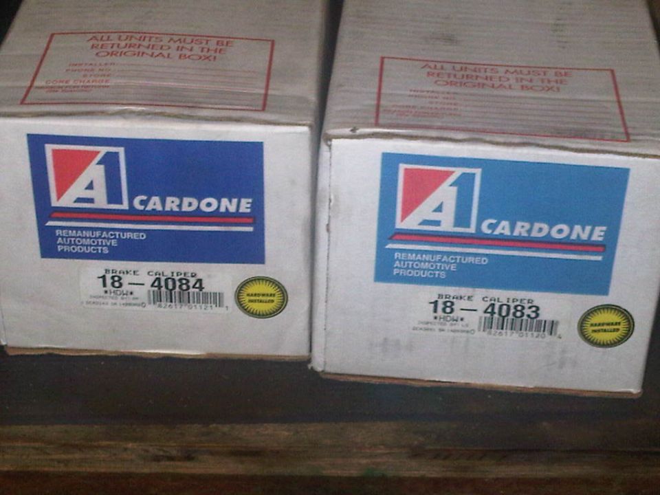 Two A1 Cardone boxes, one labeled 18-4084 and the other 18-4083, both for remanufactured brake calipers