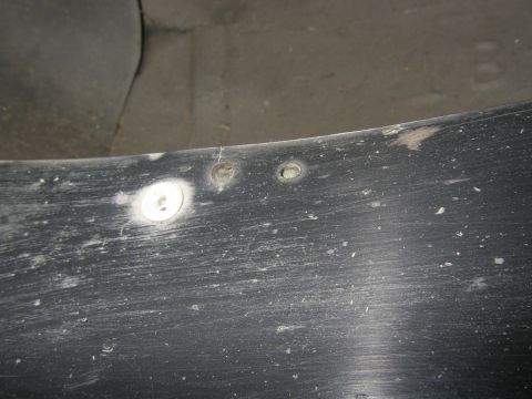 1990 Ford Bronco - This photo shows the mounting holes on a vehicle's fender flare, not the entire vehicle.