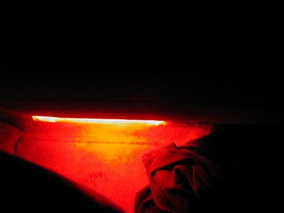 1997 Ford Taurus - Interior car light emitting red and orange glow.