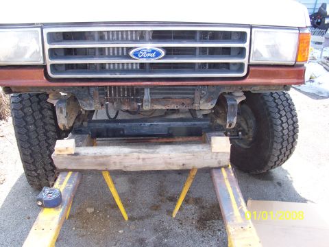 1989 Ford Bronco - The grille and headlight design suggest this Ford truck is from the late 1980s, likely a 1987 model.