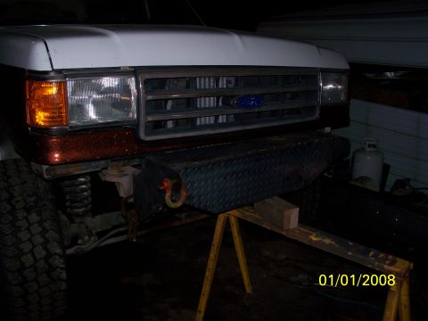 1989 Ford Bronco - Front view of a 1989 Ford Bronco, a custom bumper and tow hook.