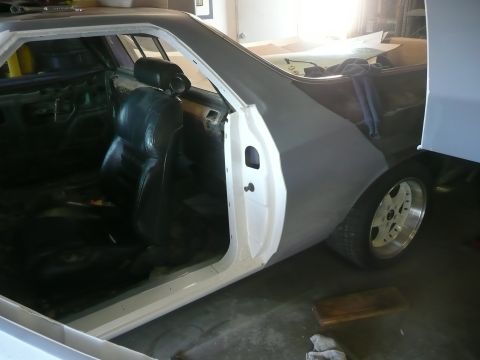 1972 Ford Ranchero - stripped , metal preped, cleaned , primered, painted, clear coated, one side done, I guess i am going with white.