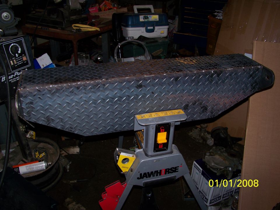 Diamond plate toolbox on a sawhorse