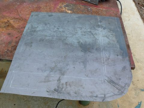 1976 Chevrolet Corvette - Sheet metal piece with scribe lines, likely for a custom fabrication project.