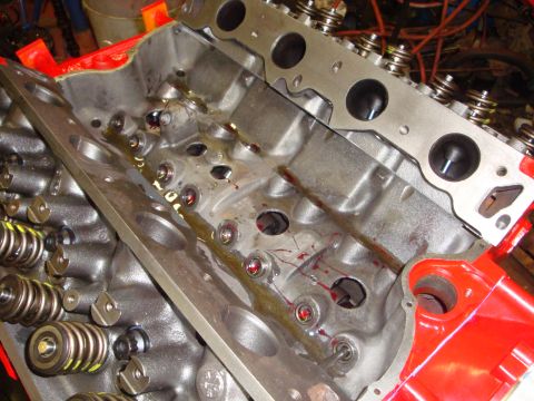 1989 Ford Bronco - Close-up of an engine block and cylinder heads during a rebuild.