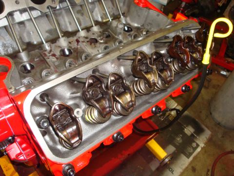1989 Ford Bronco - Engine valve train components, including rocker arms and pushrods, are shown in this close-up view.