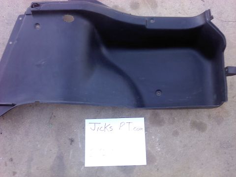1995 Ford Probe - A black plastic interior trim piece is shown with a handwritten note on white paper.