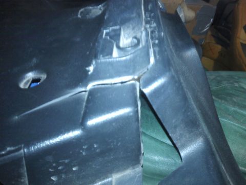 1995 Ford Probe - This photo shows a damaged plastic interior trim piece, not a 1995 Ford Probe.