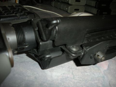 1996 Ford Bronco - A close-up view of a firearm receiver assembly, with a keyboard and mouse visible in the background.