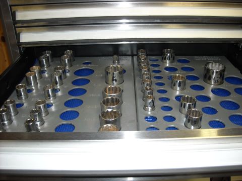 1979 Ford F-150 - A variety of sockets are neatly arranged in a toolbox drawer, ready for use.