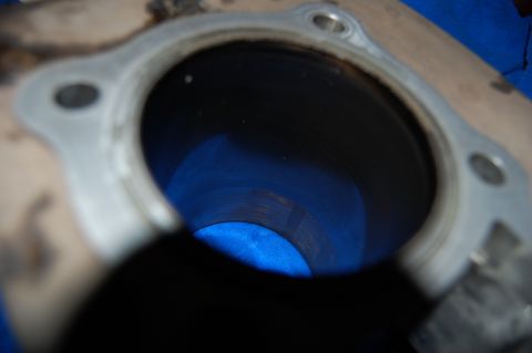2006 Honda RANCHER - Engine cylinder bore detail, showing internal machining marks and mounting flange.