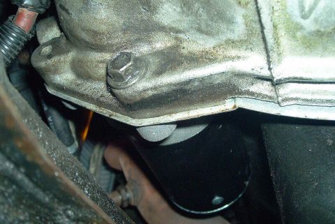 1993 Ford Taurus - Remove the lower starter nut, and then the upper starter nut that the grounding wire was attached to. Remove the starter. Install is revers…