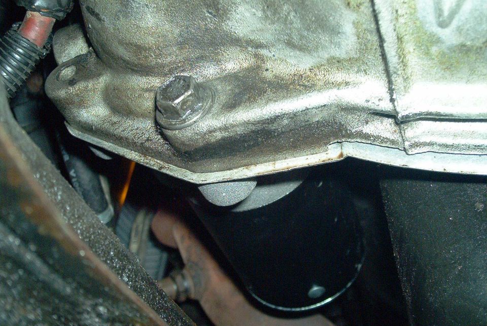 Remove the lower starter nut, and then the upper starter nut that the grounding wire was attached to.  Remove the starter.  Install is reverse of removal.