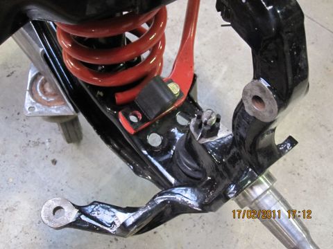 1973 Ford Ranchero - Close-up of a vehicle's suspension system, with a timestamp and website visible.