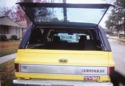 1981 Chevrolet Blazer - Rear view of a yellow 1981 Chevrolet Blazer with its tailgate open.
