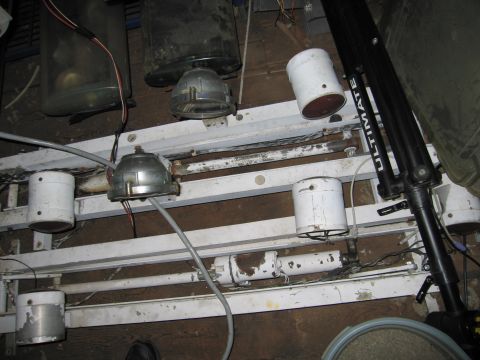 2001 Ford Crown Victoria - A complex lighting rig with numerous lamps and exposed wiring is mounted on a metal frame.