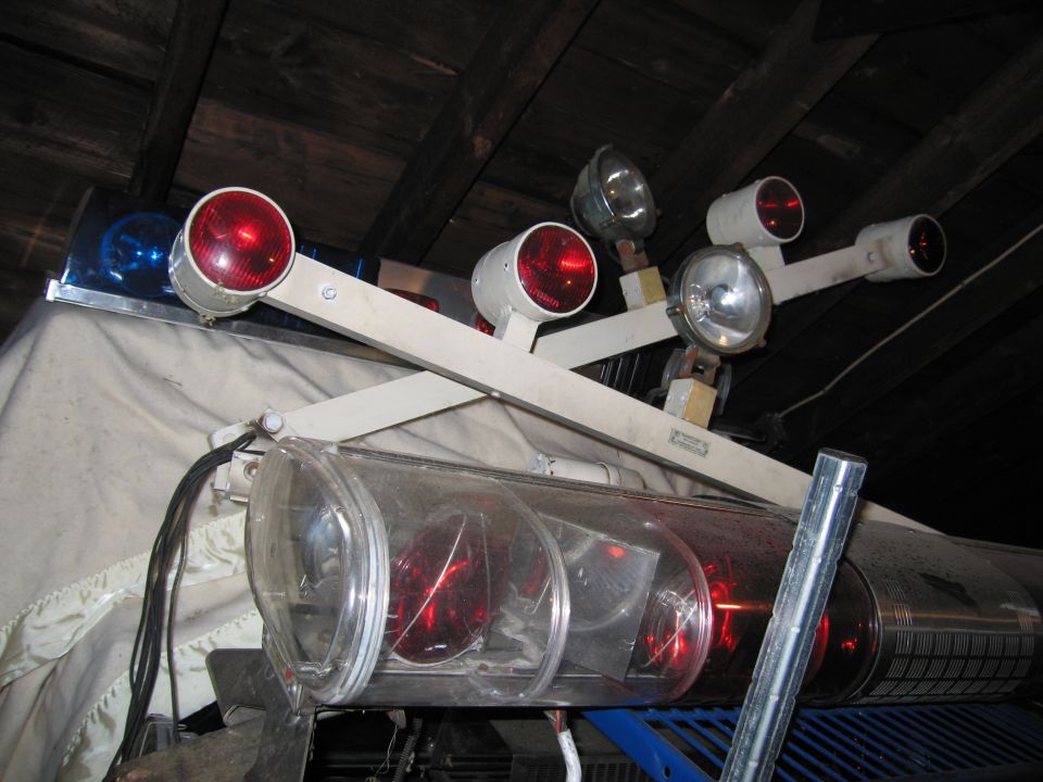 Emergency light bar with red and blue lights and spotlights