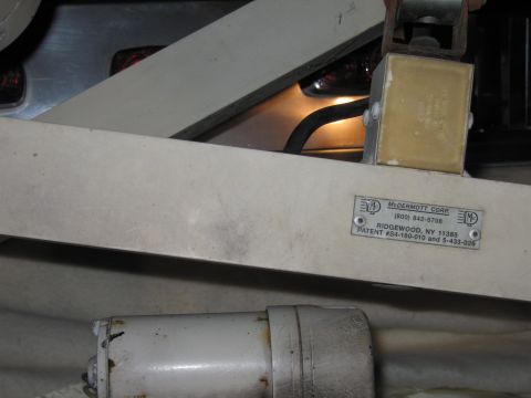 2001 Ford Crown Victoria - A label on a piece of equipment shows manufacturer details and patent information.