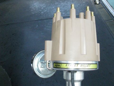 1965 Ford Galaxie - Close-up of an Accel Street Billet distributor cap, a part not indicative of a specific vehicle year.