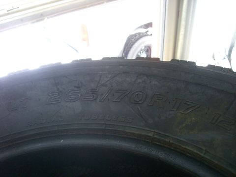 2005 Dodge 3500 - Close-up of a tire showing its size and specifications.
