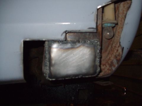 1979 Ford Bronco - This photo shows a section of a vehicle's body that has undergone a metal repair with welding.