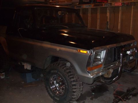 1979 Ford Bronco - Front view of a 1978 Ford Bronco showing its grille and bumper area.
