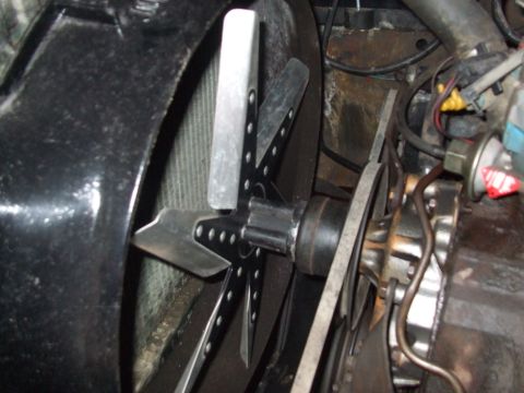 1979 Ford Bronco - Close-up view of an engine's fan and pulley system.