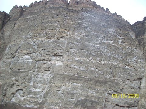 1986 Chevrolet Blazer - A rock face is shown with a date stamp of 09/19/2009 and the SuperMotors logo at the bottom right.