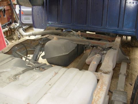 1995 Ford F-150 - It'll be much easier to work on the tanks this way, rather than from below. Go to the NEXT pic...
