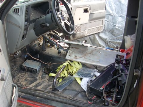 1992 Ford Ranger - Vehicle interior disassembled, showing exposed wiring and components on the floor.