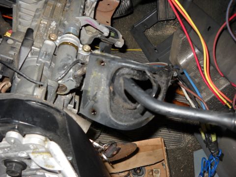 1993 Ford C-150 (Centurion Conversions) - Interior view of a vehicle's steering column assembly with exposed wiring and mechanical parts.