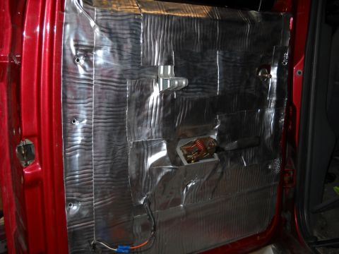 1993 Ford C-150 (Centurion Conversions) - The interior door panel has been removed to reveal sound deadening material and internal components.